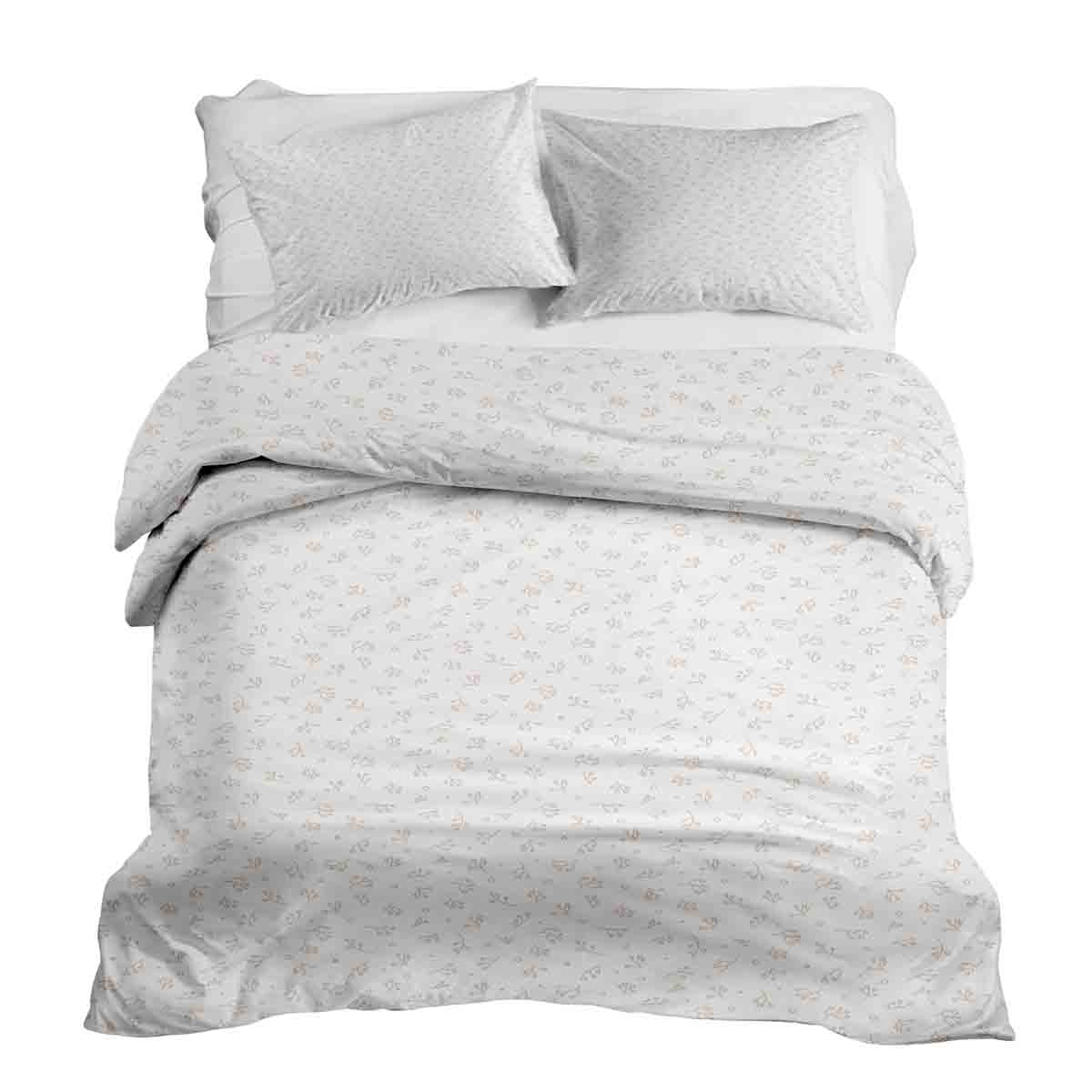 Ensemble de linge de lit avec couvertures thérapeutiques et bouquets de fleurs délicats