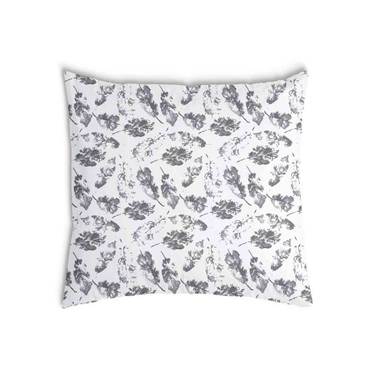 Coussin de santé blanc avec feuilles grises