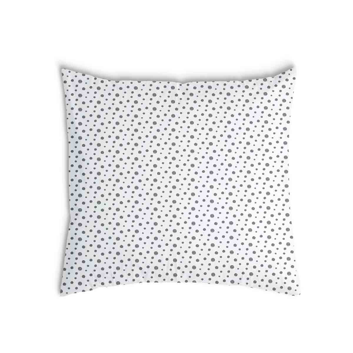 Coussin de santé blanc avec de nombreux points gris