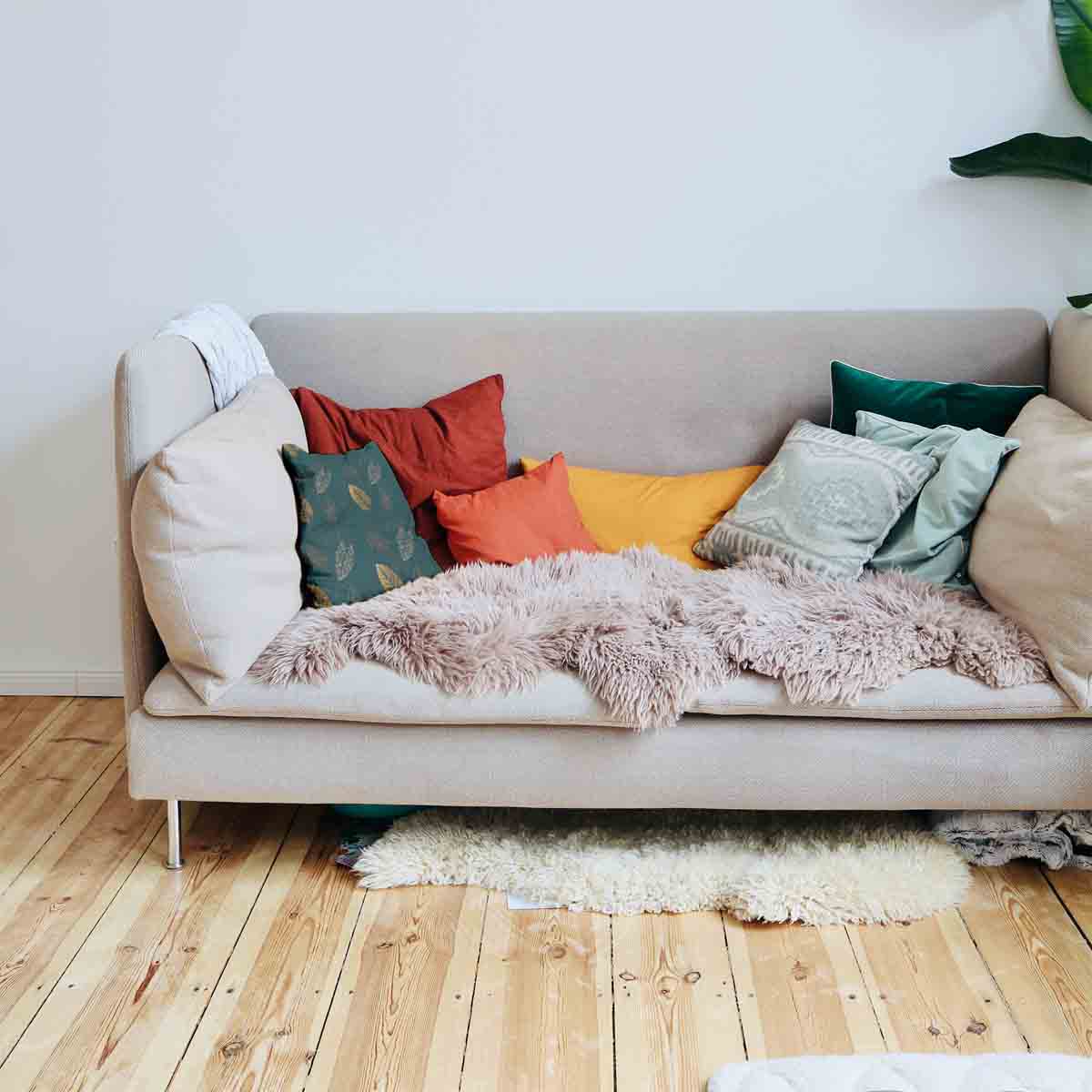 Coussin de santé vert avec feuille dorée