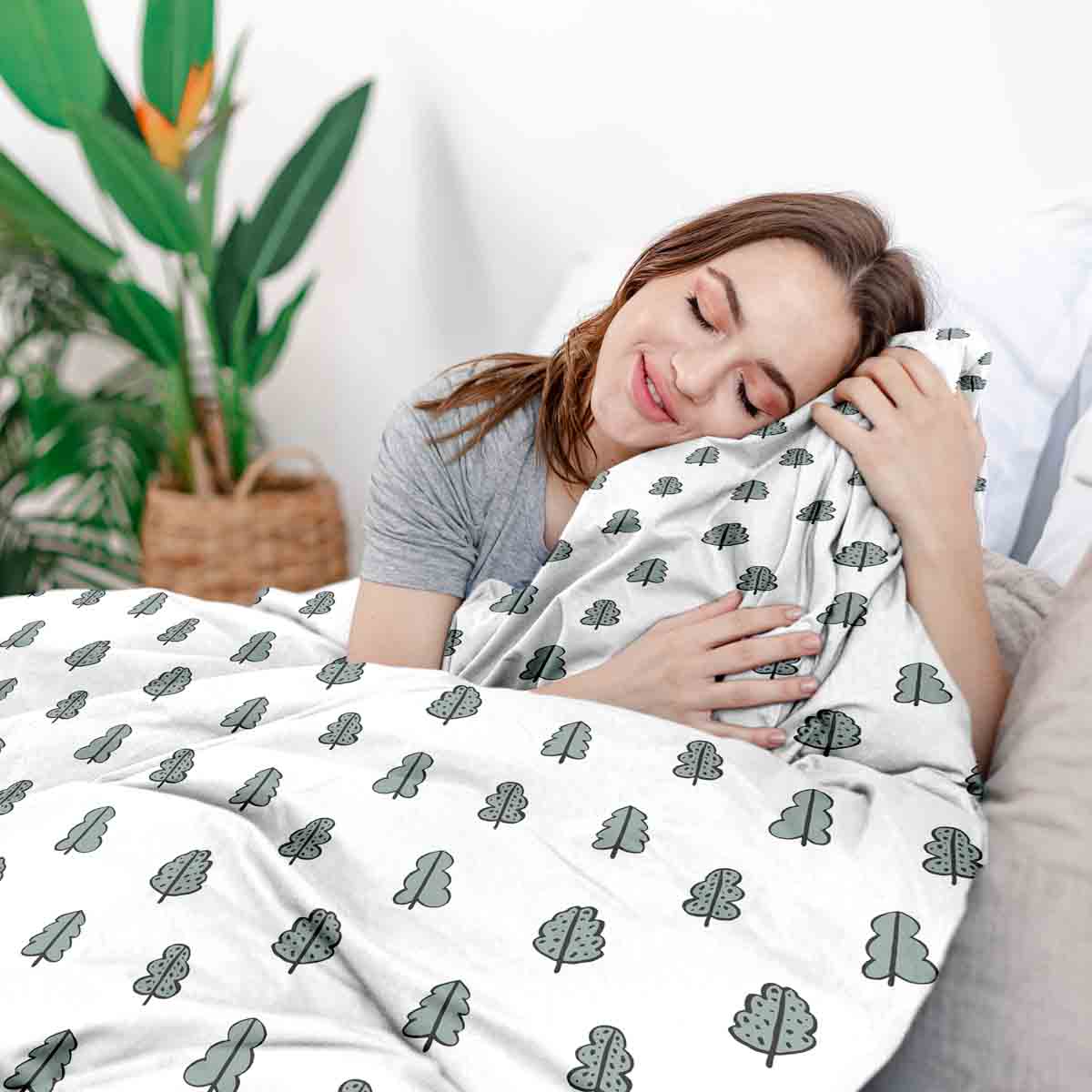 Ensemble de literie avec couverture thérapeutique blanc avec petits arbres