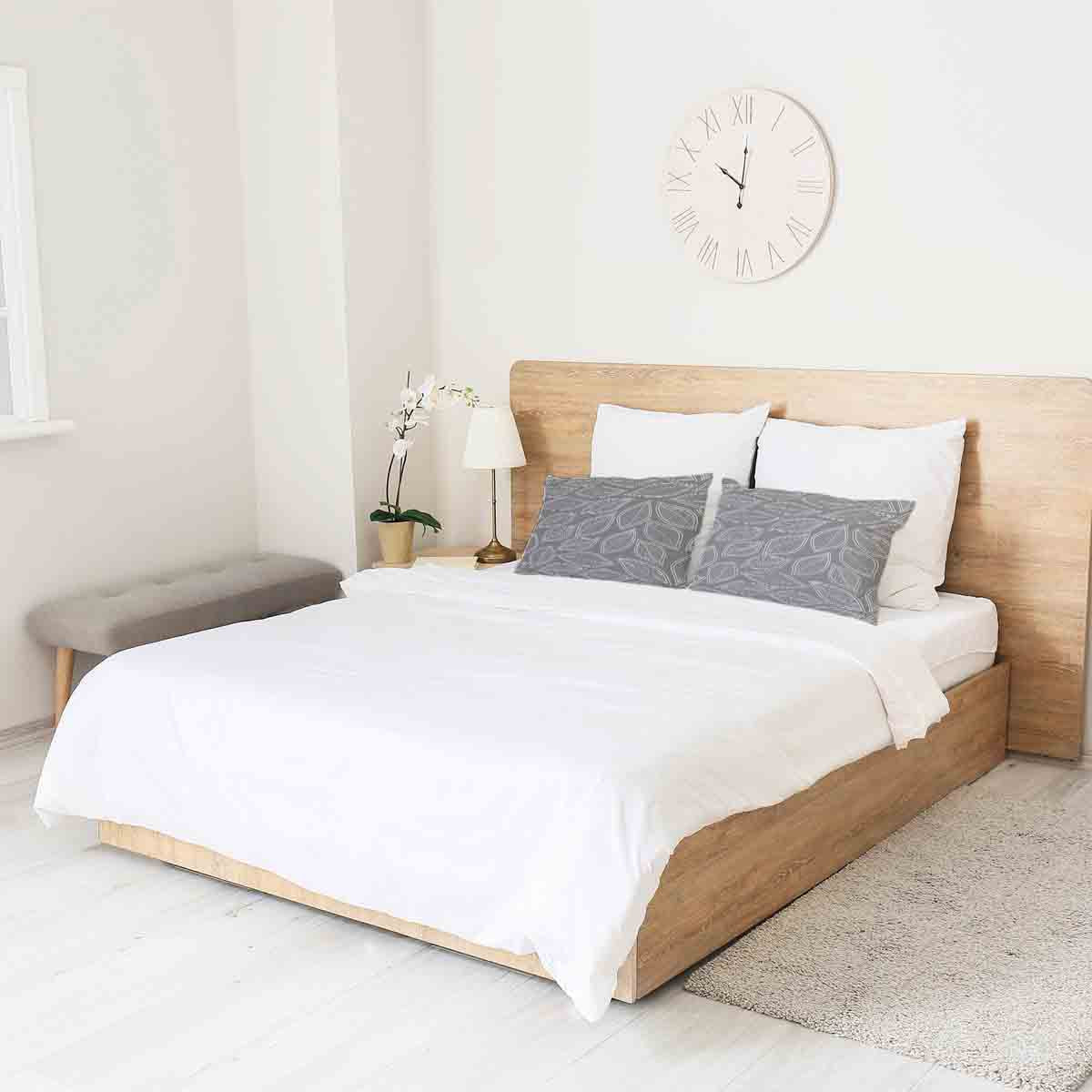 Coussin de santé gris avec feuilles de palmier blanches