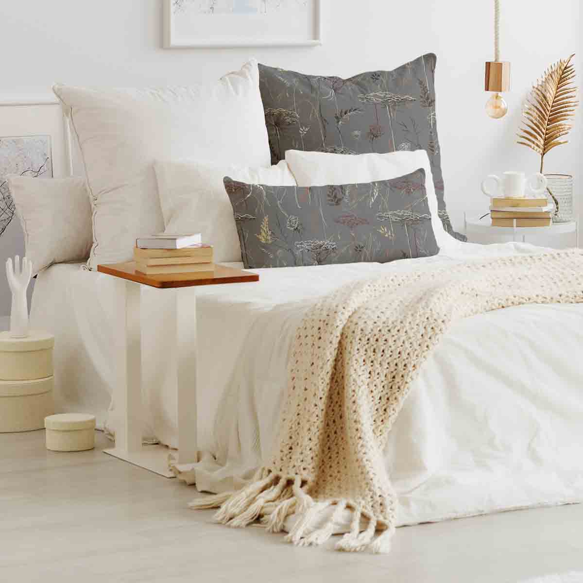 Coussin de santé gris avec plantes dorées