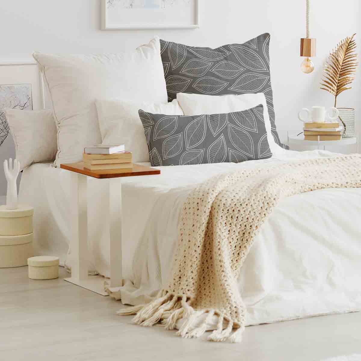 Coussin de santé gris avec feuilles de palmier blanches