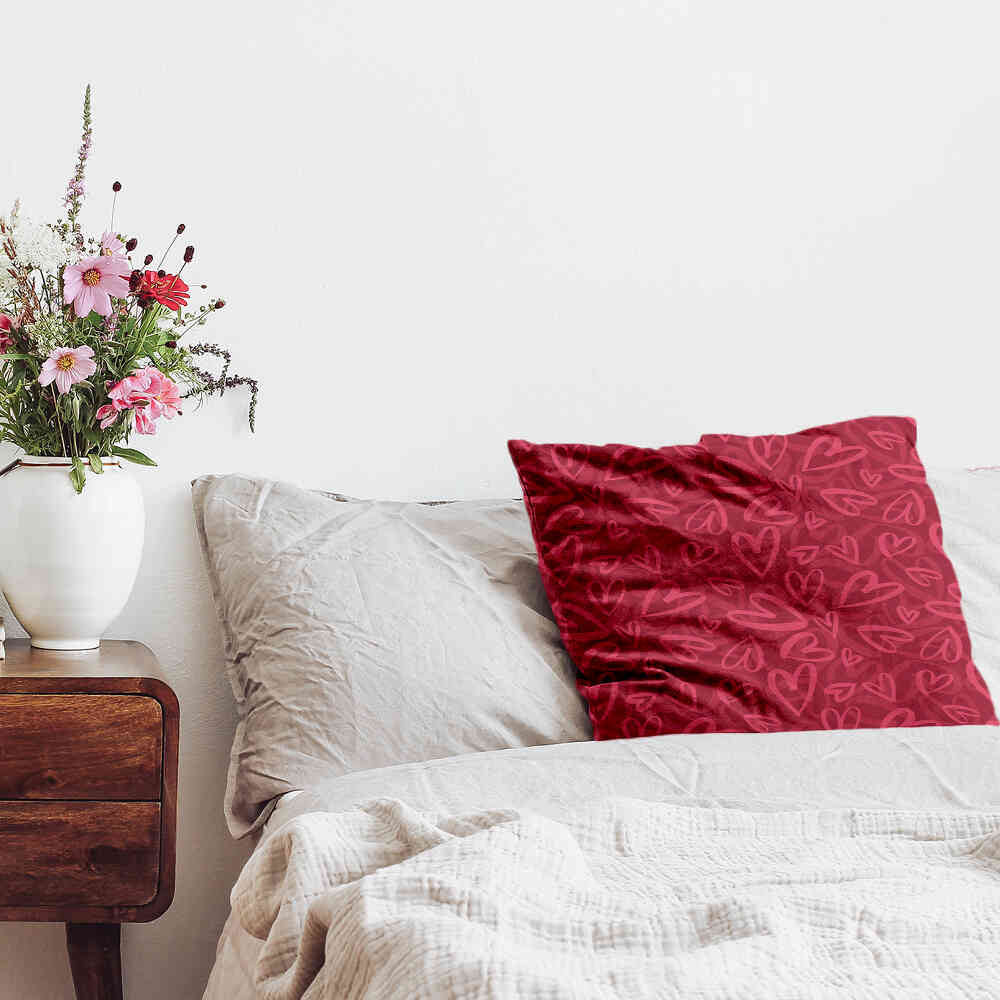 Coussin de santé rouge avec motif cœur rose