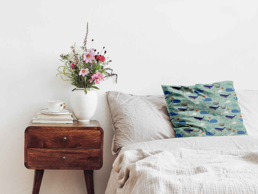 Coussin de santé vert avec des baleines