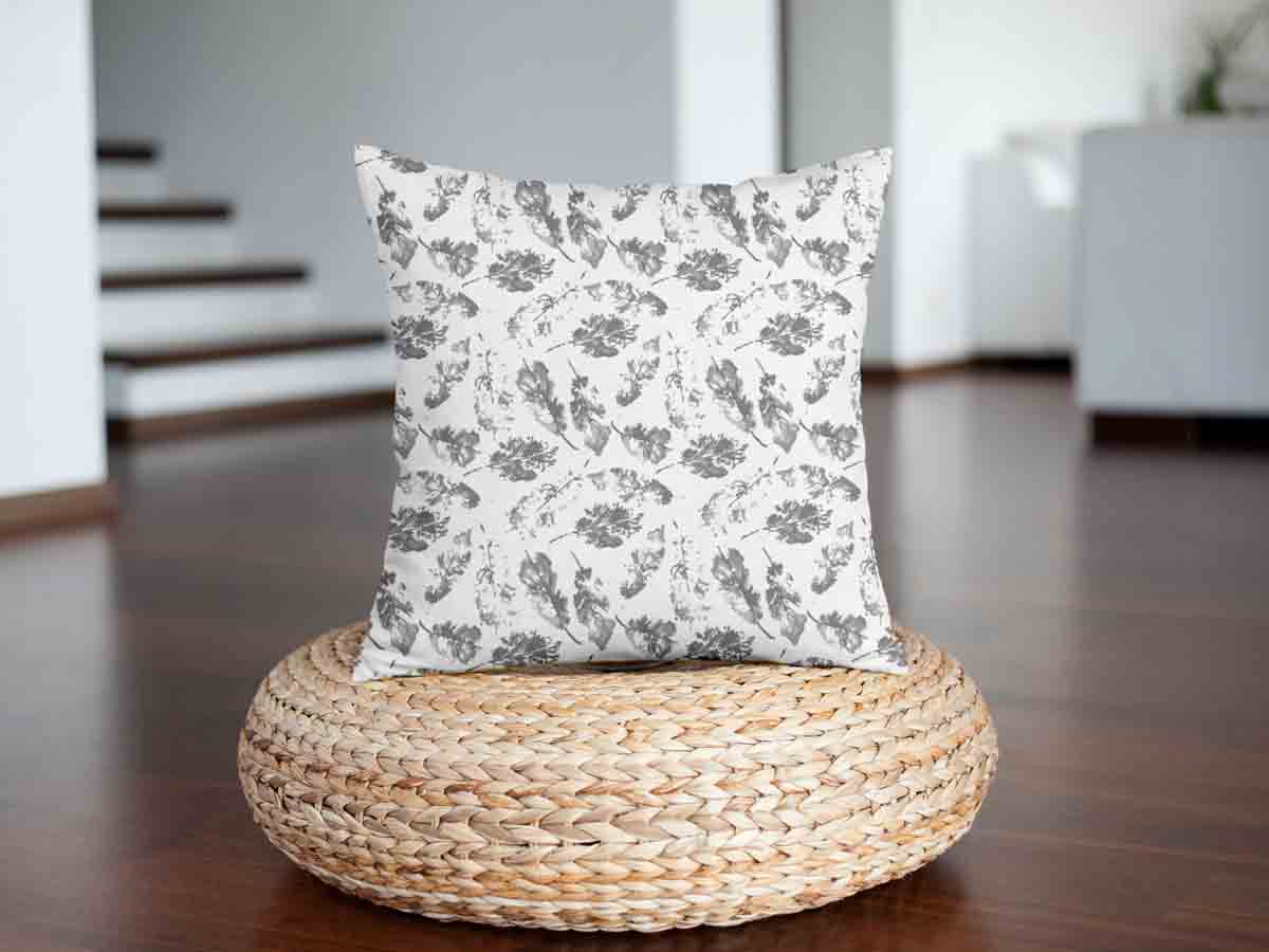 Coussin de santé blanc avec feuilles grises