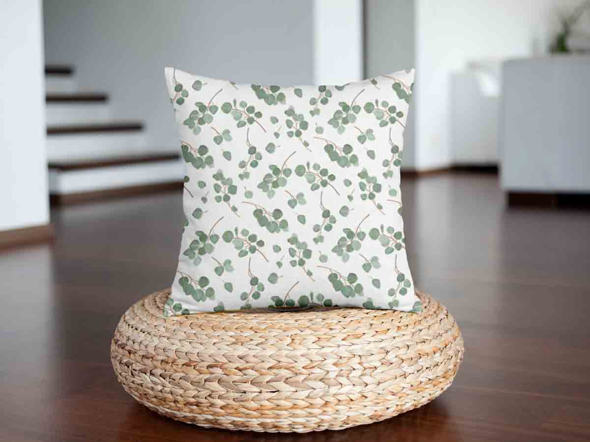 Coussin de santé blanc avec branches d'eucalyptus