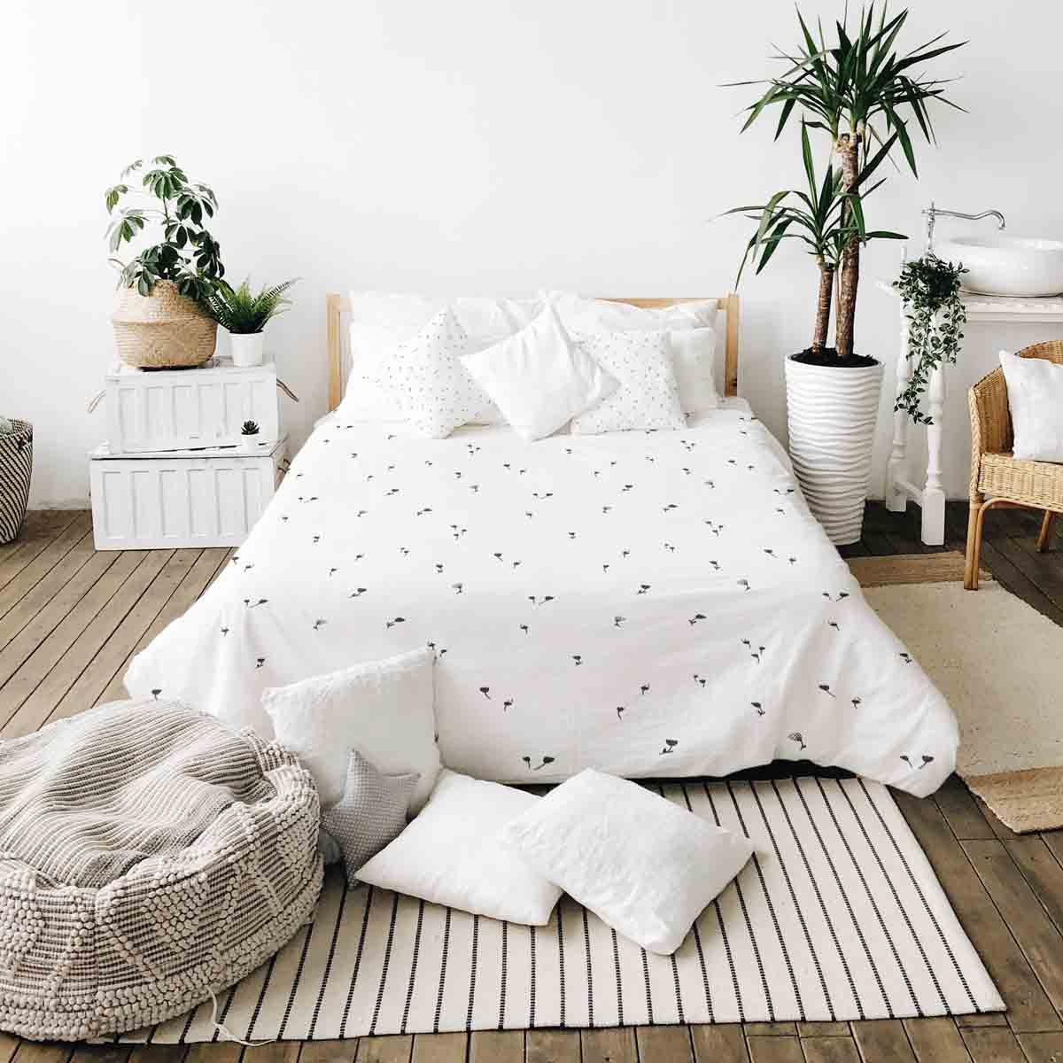 Ensemble de literie avec couverture thérapeutique blanc avec pissenlits noirs