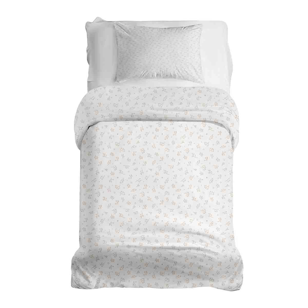 Ensemble de linge de lit avec couvertures thérapeutiques et bouquets de fleurs délicats