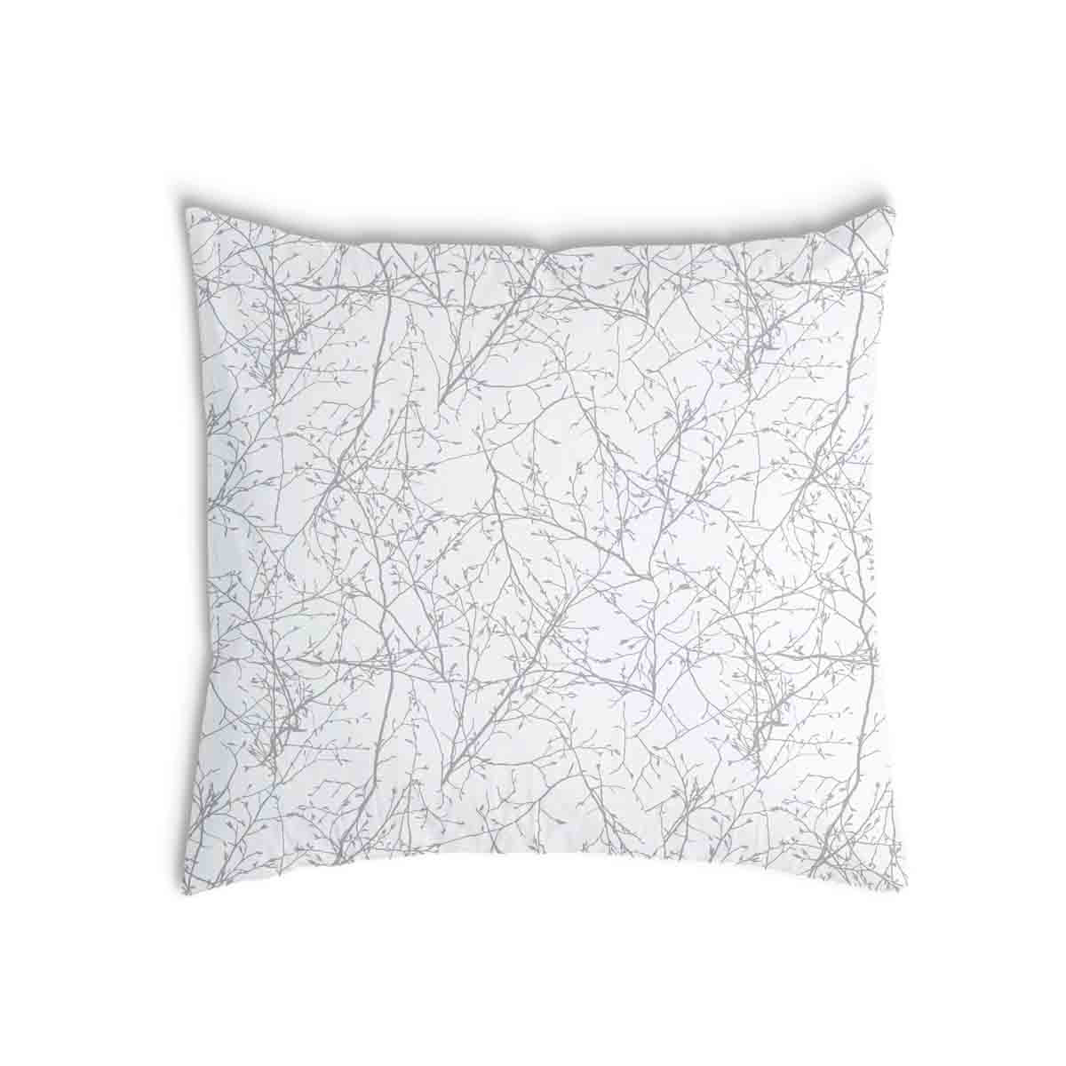Coussin de santé blanc avec de délicates branches grises