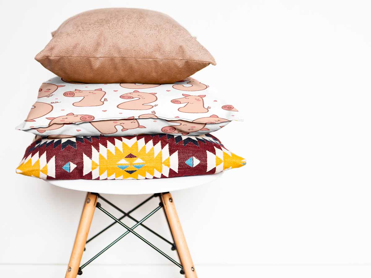 Coussin de santé blanc avec chiffres et cochons