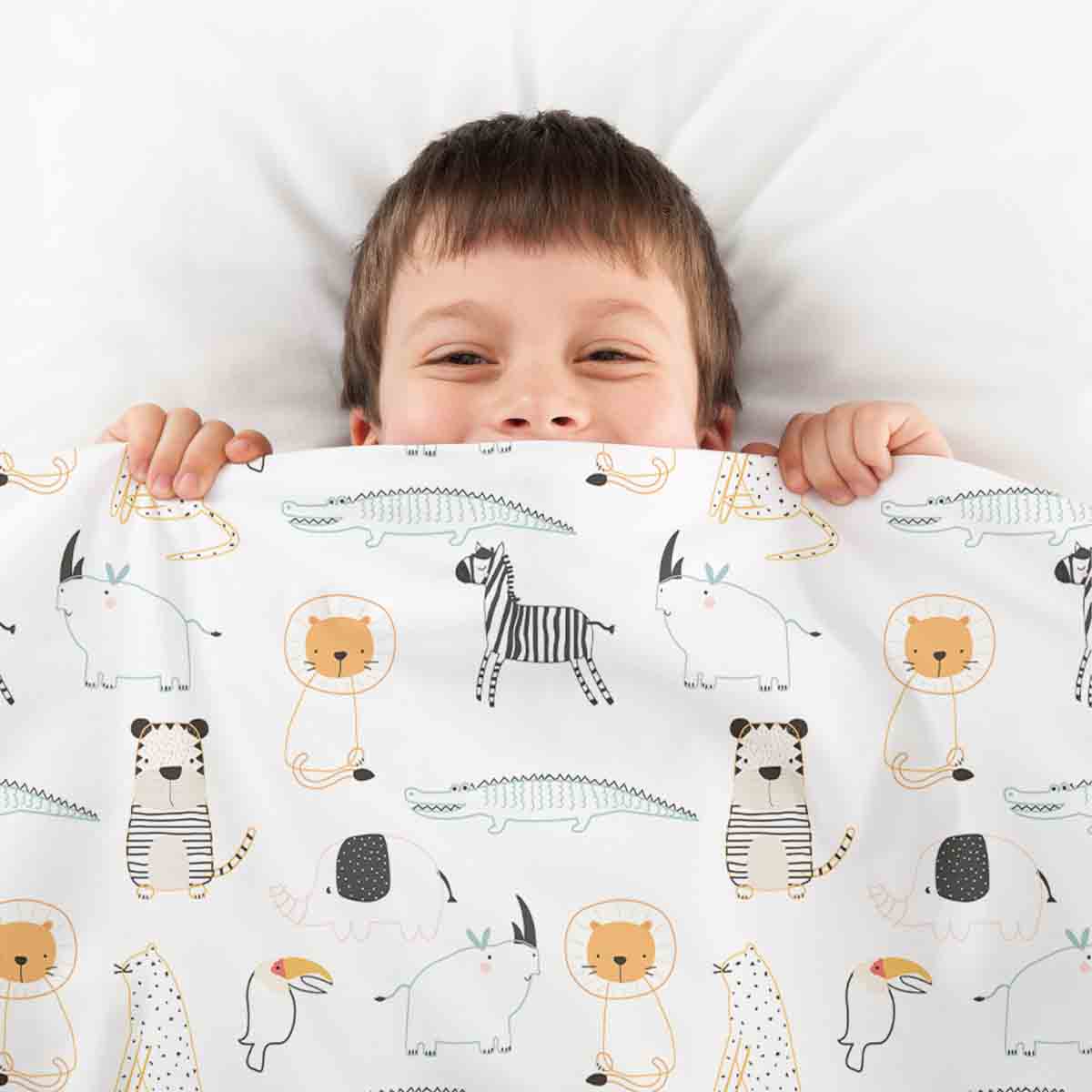 Ensemble de literie avec couvertures thérapeutiques blanches avec animaux du zoo
