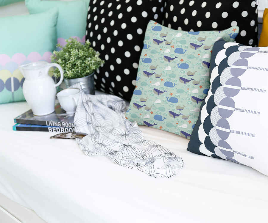 Coussin de santé vert avec des baleines