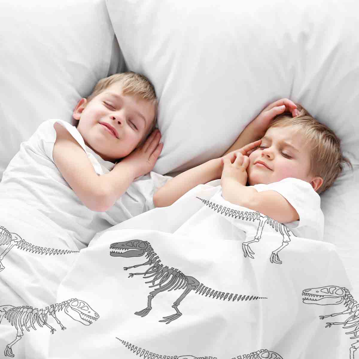 Ensemble de literie avec couverture thérapeutique blanc avec squelette de dinosaure