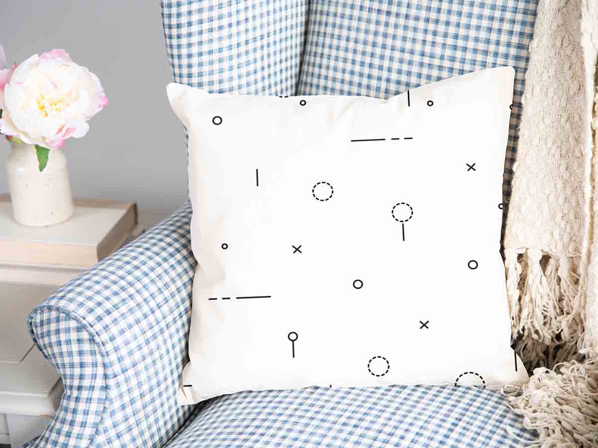 Coussin de santé blanc avec formes noires