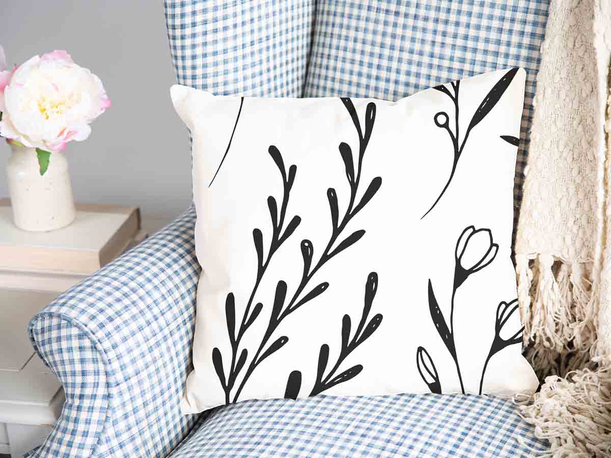 Coussin de santé blanc avec des branches noires