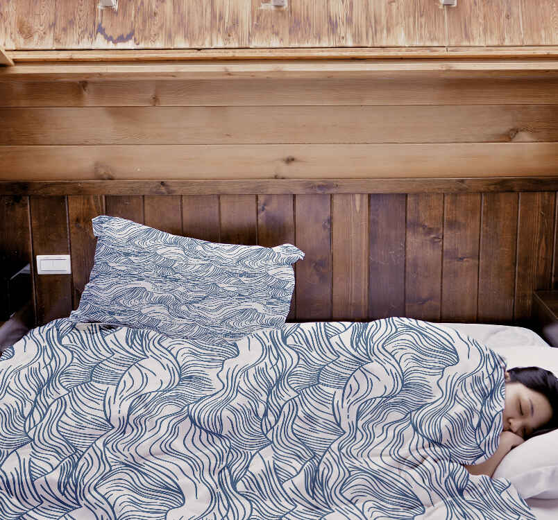 Ensemble de linge de lit avec couverture thérapeutique motifs ondulés en bleu