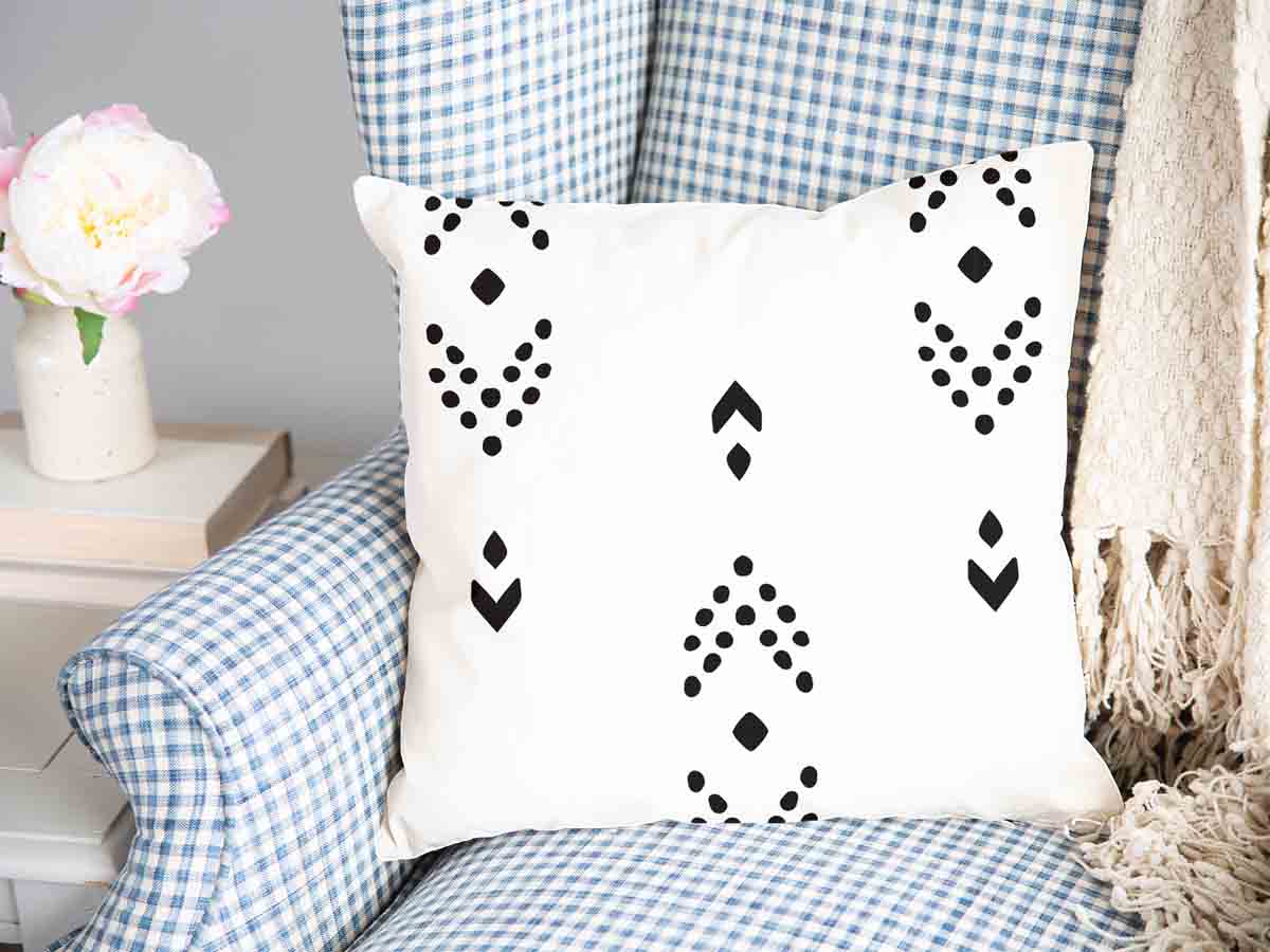 Coussin de santé blanc avec motif de flèches noires